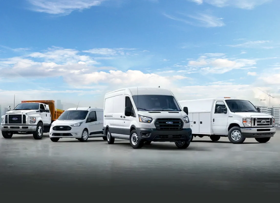 A line-up of commercial work trucks and vans